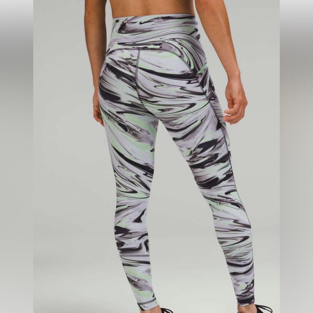 NWT Lululemon Swift Speed High-Rise Tight 28"
Paint Glide Warp Multi Sz 0